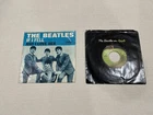 The Beatles 45 RPM Vinyl Singles With Original Sleeves - Lot Of 2