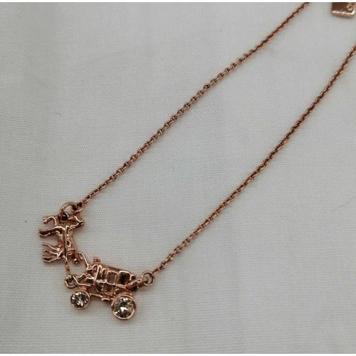 Bracciale COACH carrozza oro rosa