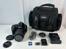 Nikon D5100 DSLR Camera 18-55mm f/1:3.5-5.6 Auto Focus-S Nikkor Lens MORE