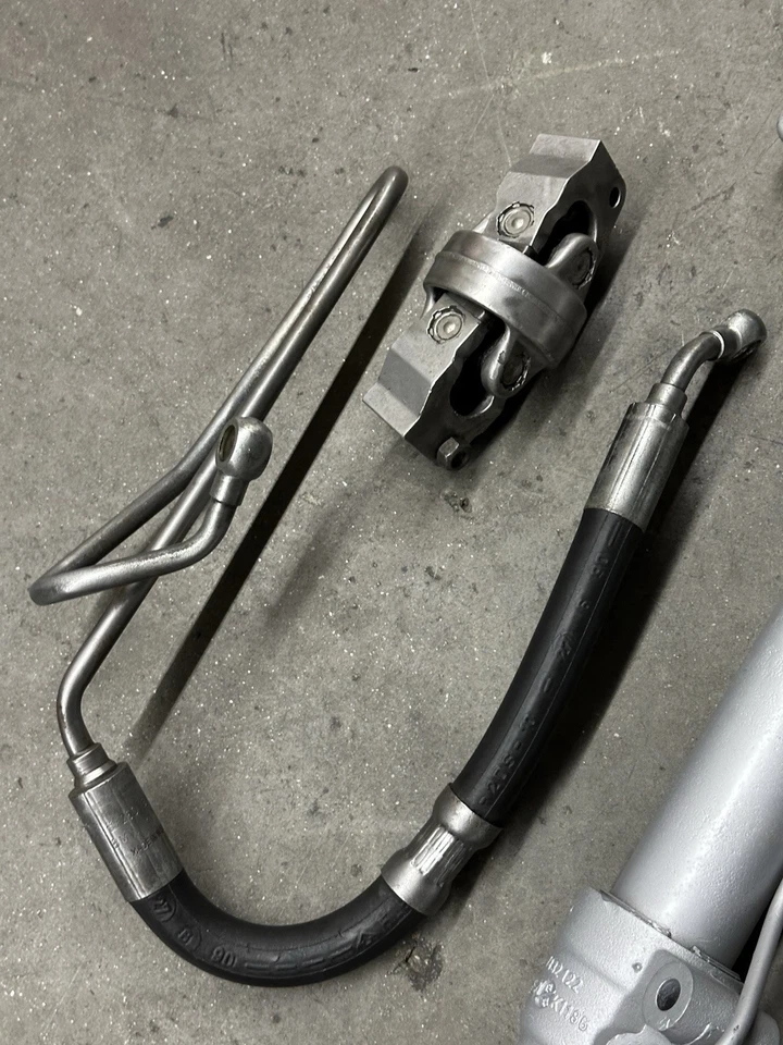 Conjunto de piñón de cremallera de dirección asistida AWD BMW E30 325ix 88-91 reconstruido fabricante de equipos originales de fábrica Foto 2 de 4