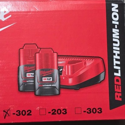 Milwaukee M12 NRG-302 Akku Starter Set 2x3,0Ah 12V Neu