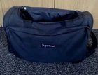 Sac de sport SS15 Supreme noir avec sangle skate board 1000 deniers Cordura