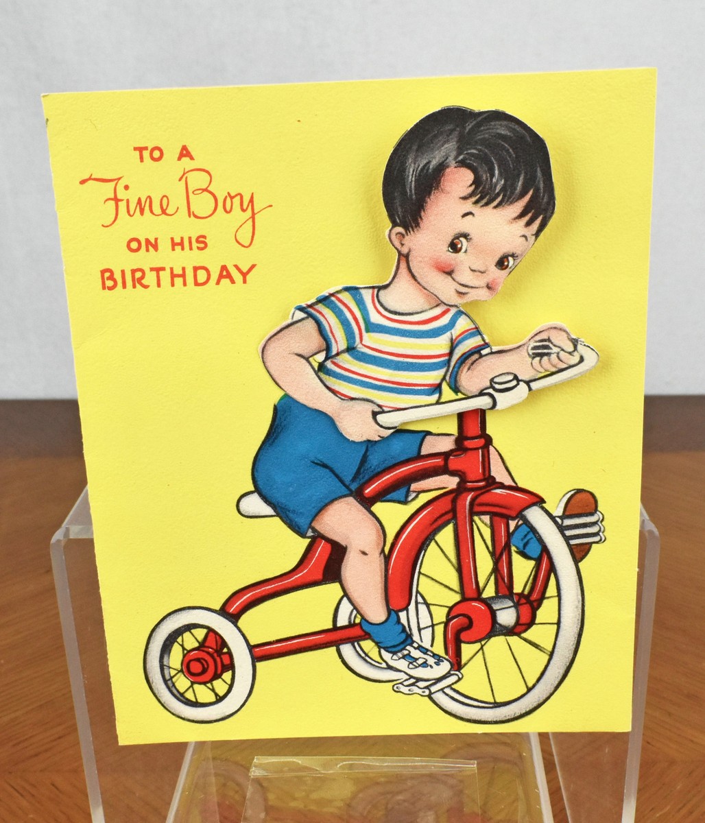 Vintage French postcard of young boy on his tricycle Vintage French postcard of young boy on his tricycle