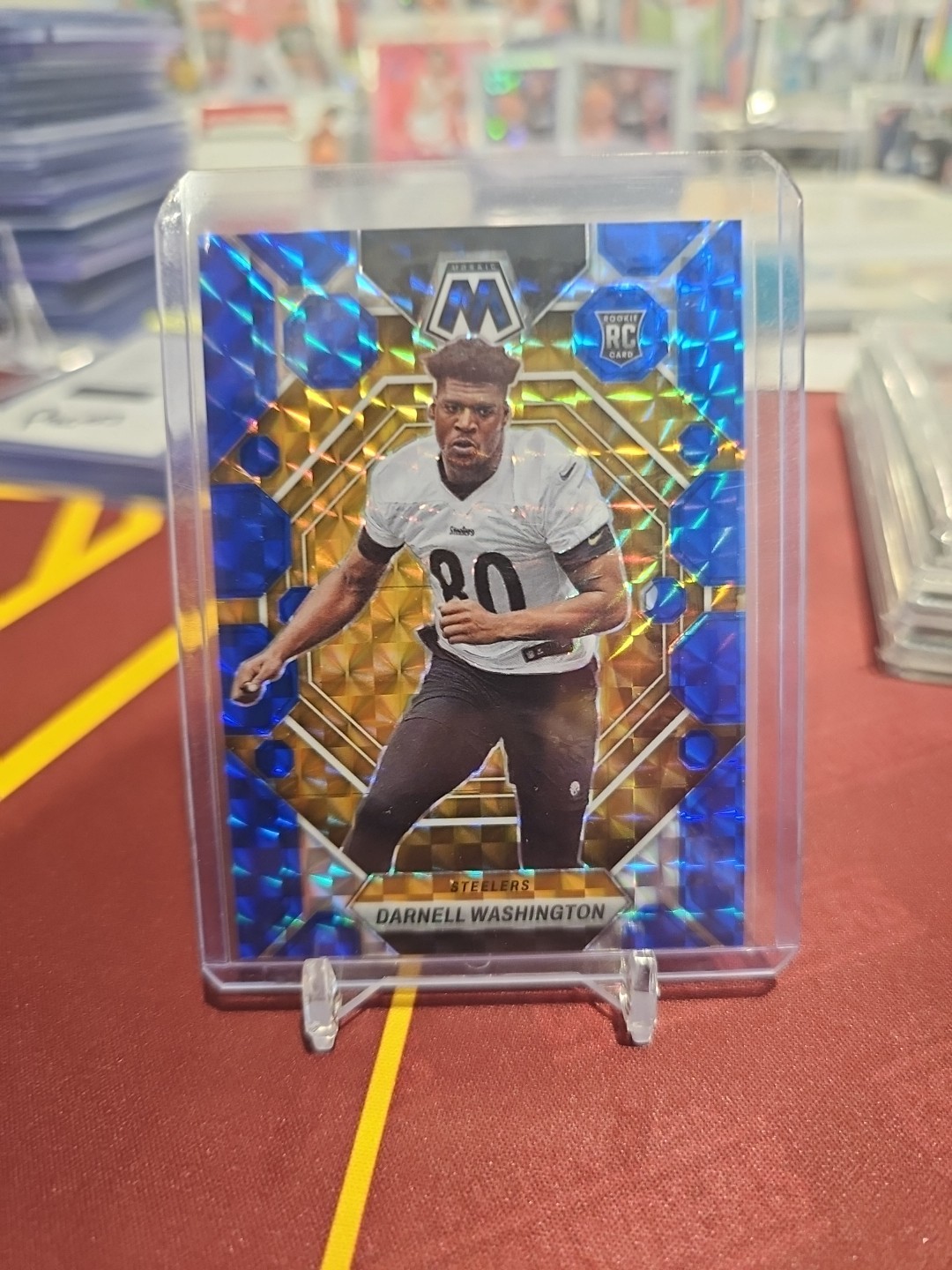 2023 Panini Mosaic - Rookies Darnell Washington #306 Blue Mosaic Prizm /99 (RC)