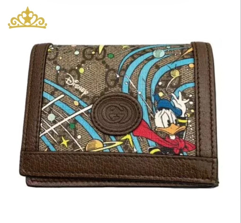 Portefeuille compact GUCCI Disney GG Supreme à deux volets Donald Duck Collaboration