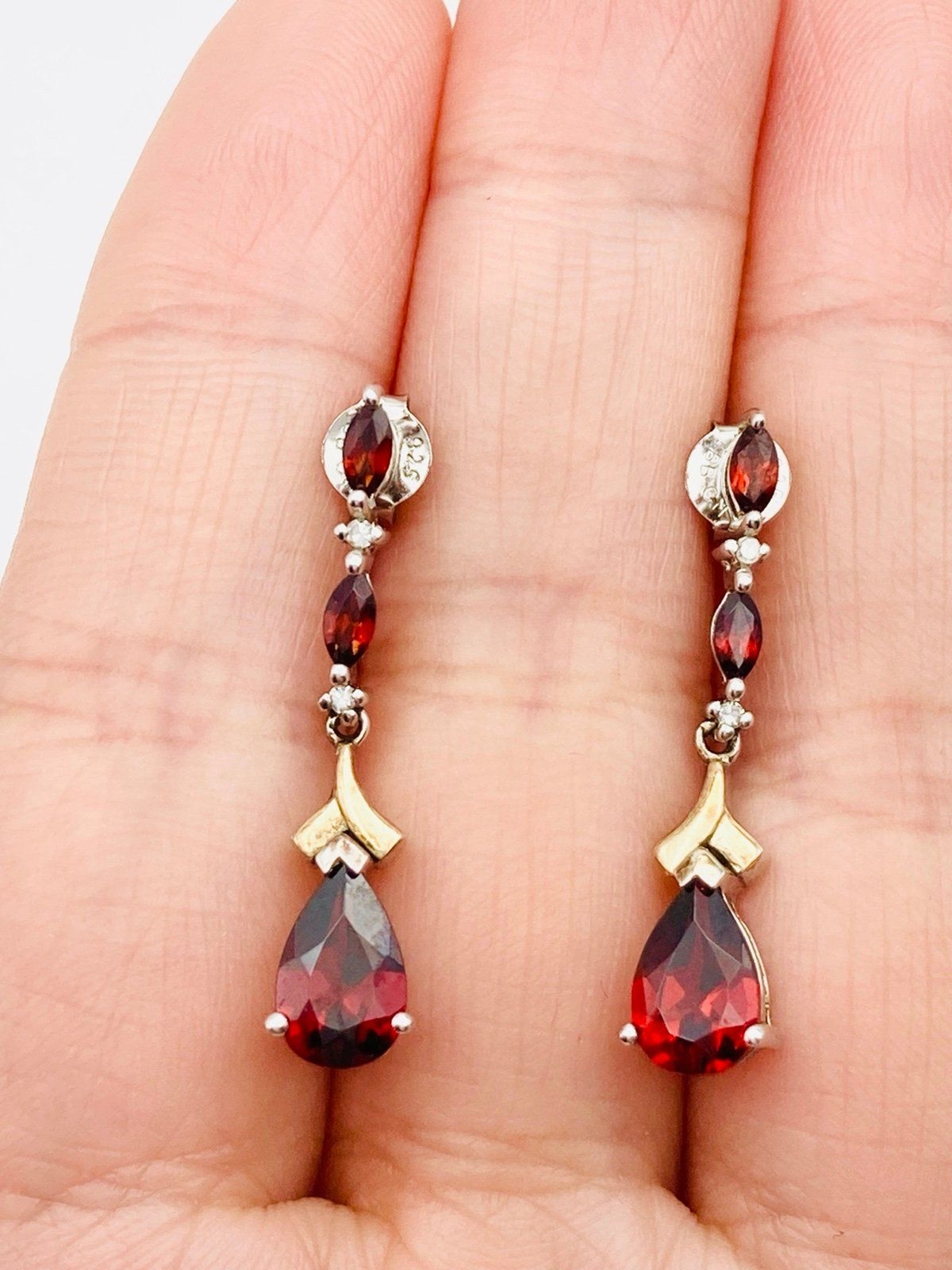 Zales natural garnet diamond earrings setting in sterling silver and 14k