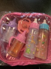 New Toy- baby bottles and pacifier, 5 piece set w/ pink, zip up, carrying bag