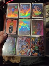 Binder of assorted nostalgia cards. Marvel, DC, Educational, sports.