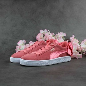 pink pumas with bow