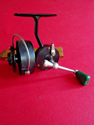 A RARE MODEL (GREEN HANDLE/DRAG KNOB) USED VINTAGE MITCHELL 314 SPINNING REEL