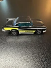 Hot Wheels Blackwall 1977 57 Chevy Jet Black w Yellow Tampo Blue Glass