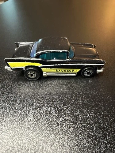 Hot Wheels Blackwall 1977 57 Chevy Jet Black w Yellow Tampo Blue Glass