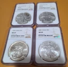 Lot of (4) Graded Silver Eagles - NGC MS 69 / 1991, 1992, 2001, 1998 Minor Flaws