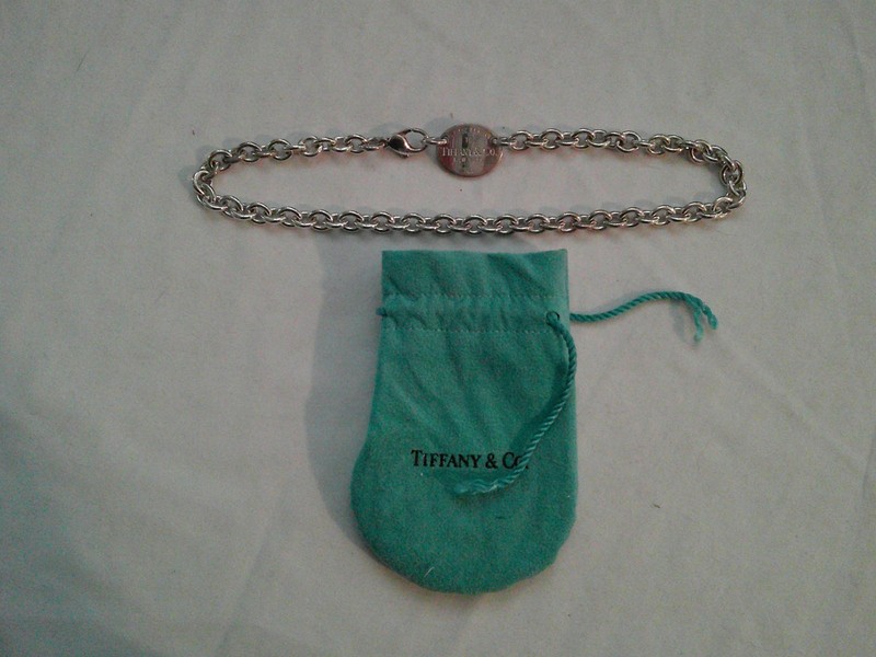 Tiffany & Co. Return to Tiffany Oval Tag Pendant Necklace Silver with blue bag