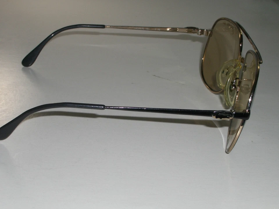 GAFAS DE SOL TRADICIONALES LACOSTE 101 57[]17 TONO MARRÓN DORADO CRISTAL FOTOCROMÁTICO Foto 4 de 4
