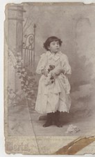 CABINET CARD STARTLED YOUNG GIRL HOLDING FLOWERS IN GARDEN. BUTLER, PA.