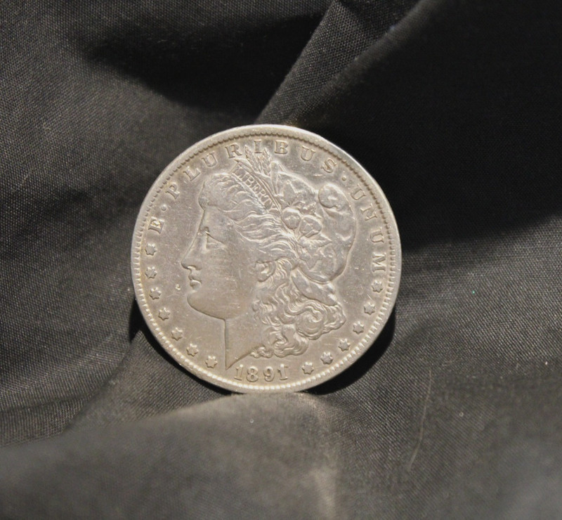 1891 CC CARSON CITY MORGAN DOLLAR. VF DETAILS / CLEANED. NO RESERVE