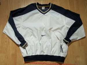 white and gold nike windbreaker