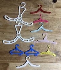 LOT OF 10 VINTAGE BARBIE 1960'S OTHER YEARS CLOTHES HANGERS VARIOUS COLORS