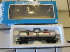 lifelike V-8 single dome advertizing tank car HO scale.