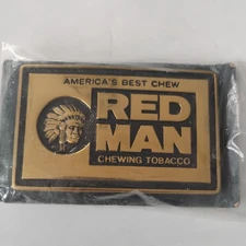 Vintage Red Man Chewing Tobacco Brass Belt Buckle. Sealed Original pack USA