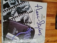 Flexi-stylers  By Nicky Clarke. Heated Styling System