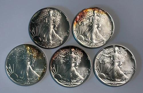 FIVE US 1 oz Silver $1 American Silver Eagles, 1987, 1988, 1988, 1988 & 1991