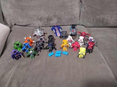 Massive 25 Piece Lot of Transformers Bot Shot Action Figures and Accessories
