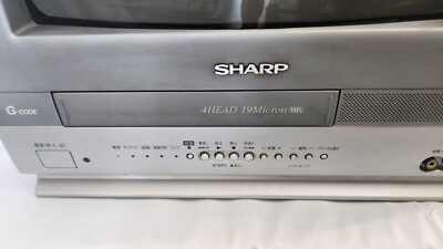 Sharp Color TV with Built-in VHS Player - Model VT-14GH10