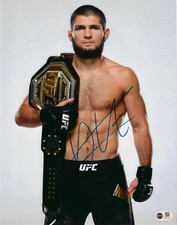 KHABIB NURMAGOMEDOV SIGNED UFC CHAMPION 14x11 PHOTO (ACG CERT AG17123)