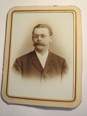 Man with Beard and Glasses in Suit - Portrait Named: Father Elle / KAB