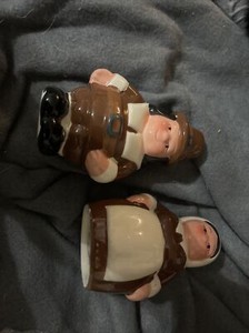 Publix's The Pilgrim Pair Salt and Pepper Shakers And Napkin Holder. Used