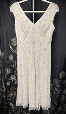 Adrianna Papel Knee-length Beaded Gown