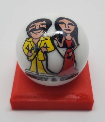 Sonny & Cher Glass 1'' Logo Marble w/ Colored Stand