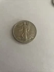 1940 Walking Liberty silver half dollar.