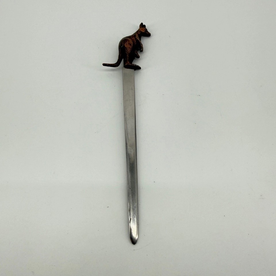 A stainless steel bronze-toned kangaroo letter opener — wildly specific, utterly charming novelty desk piece.