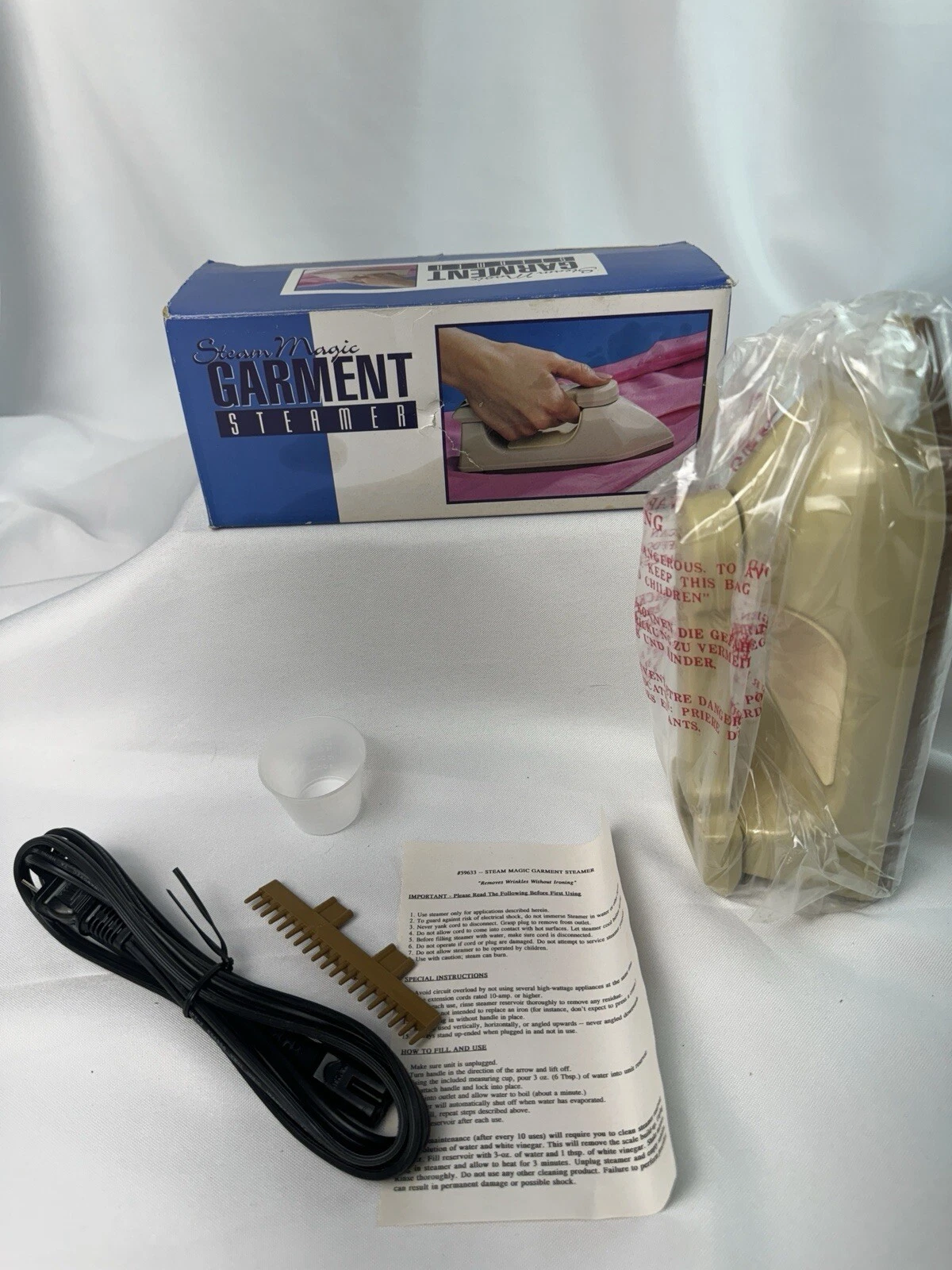 VTG 70s 80s Steam Magic Garment Steamer NIB #59633 Compact Travel Retro Iron
Opens in a new window o