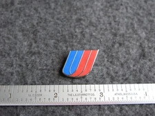 UNITED AIRLINES / UAL SILVER TRIM COLORED TULIP LOGO PIN.