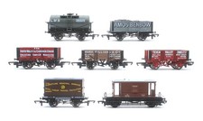 VARIOUS BRANDS 'OO' GAUGE RAKE OF 7 ASSORTED TANK/ PLANK/ CONFLAT/ BRAKE WAGONS