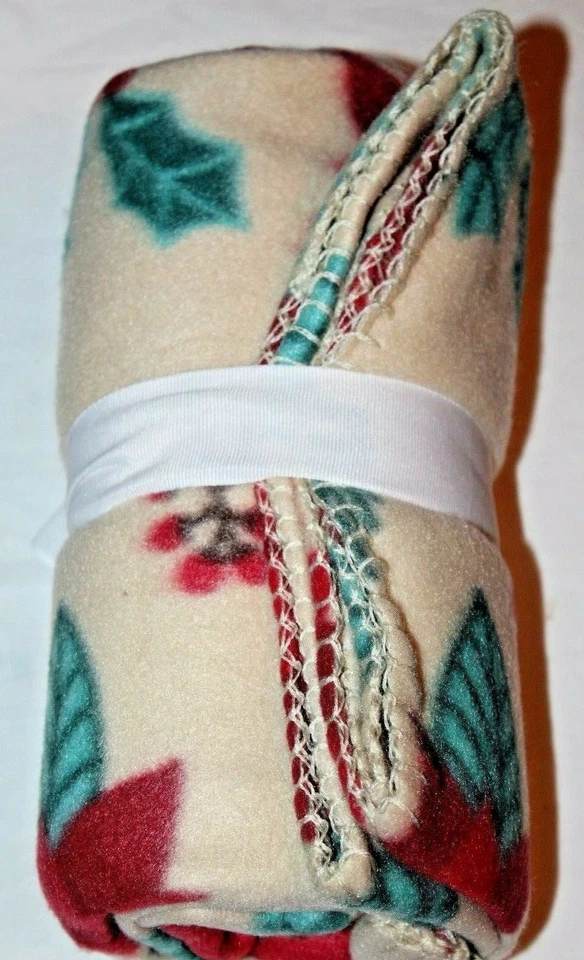 Manta polar Essential Home Navidad vacaciones roja/multi flor de pascua Foto 3 de 4