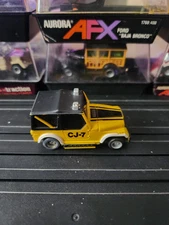 TYCO JEEP CJ-7 YELLOW / BLACK SLOT CAR NEAR MINT 100% COMPLETE NICE & CLEAN NR