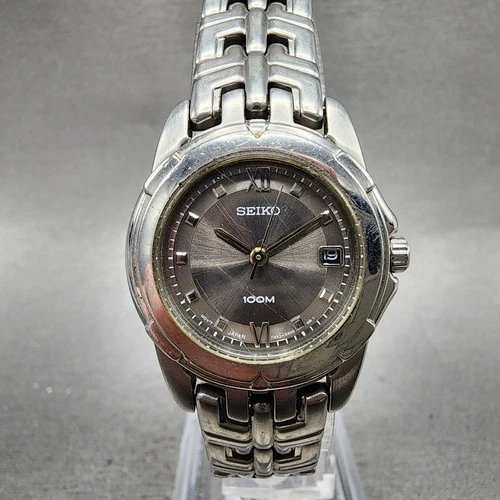 Seiko Watch Women 26mm Black Dial Silver Tone Date Round 7N82-0AM0 New Battery