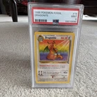 1999 Pokémon Fossil #19 Dragonite PSA 9