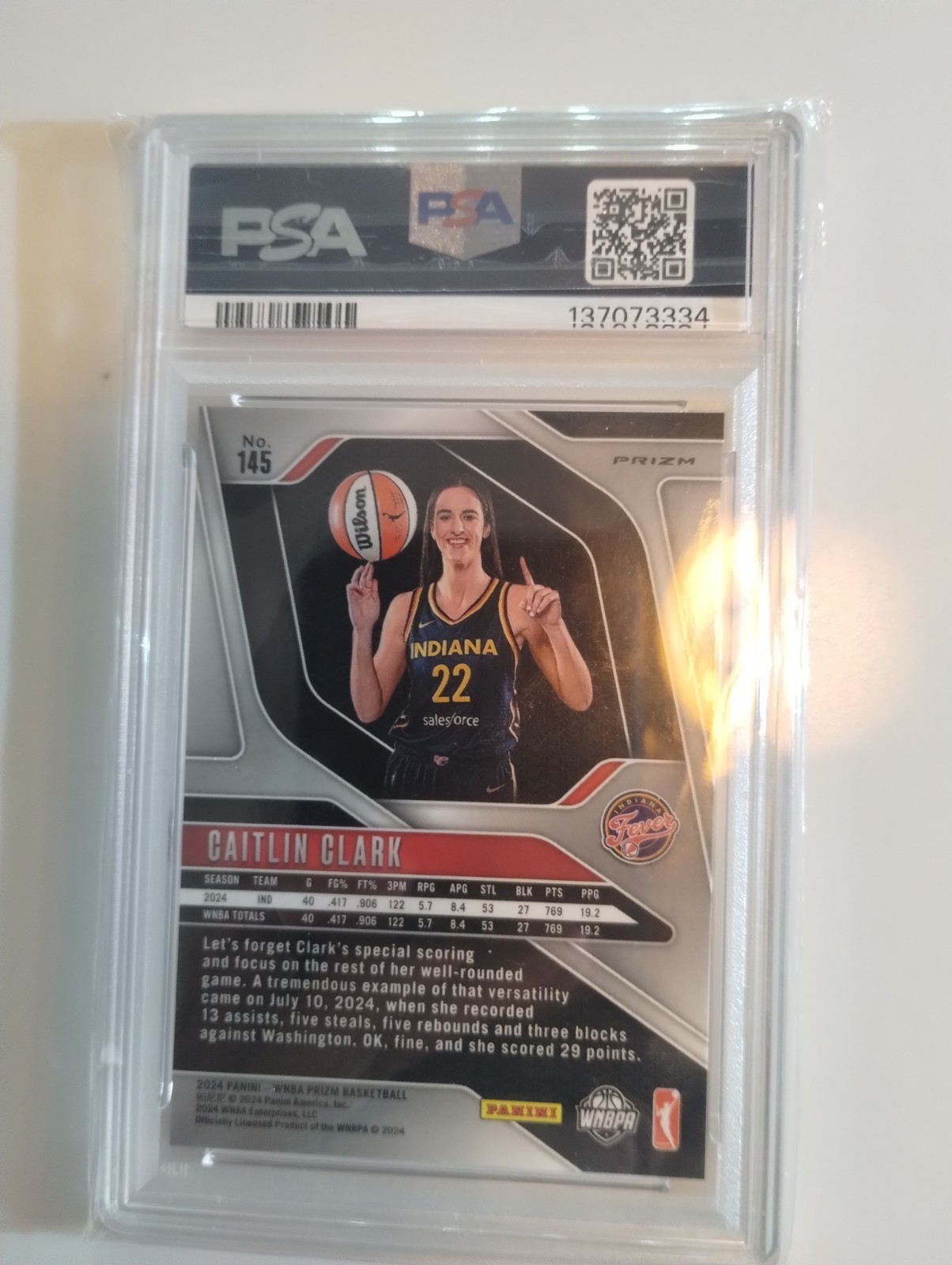 2024 Prizm WNBA - Caitlin Clark #145 Orange Ice Variation Prizm (RC) PSA 8 view 2