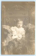 POSTCARD RPPC Baby Boy in Big Chair with Fur Blanket 1904-18 Studio Photo