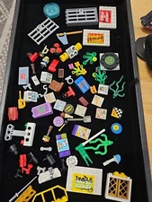 Lot of LEGO accessories specialty parts Flowes Windows Batman Maps Flags Racing