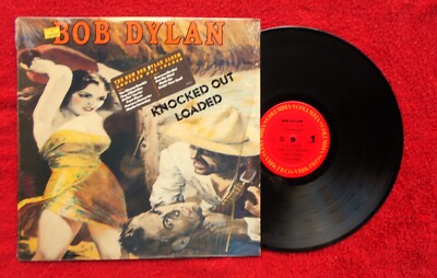BOB DYLAN    KNOCKED OUT LOADED    1986 LP WITH SHRINKWRAP AND HYPE STICKER