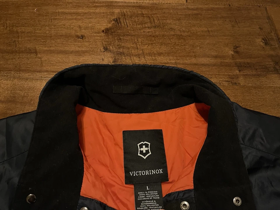 Abrigo chaqueta informal aislante azul marino con botones a presión VICTORINOX - grande para hombre Foto 3 de 4