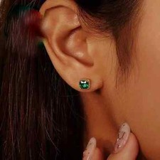 ORECCHINI ENGAGEMENT IN ORO BIANCO 18 KT. TIT. 750 CON SMERALDI E BRILLANTI.