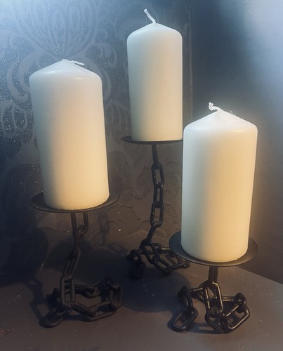 Welded 3 Metal Chain Candle Holders with candles in a Gothic Medieval style.